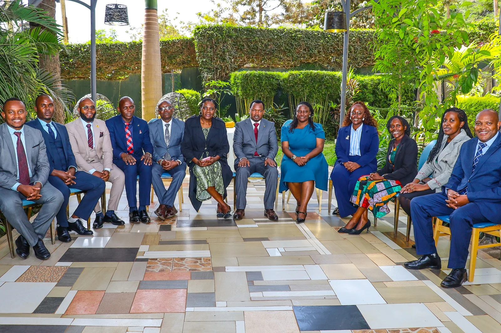 Participants posing together in an outdoor setting.