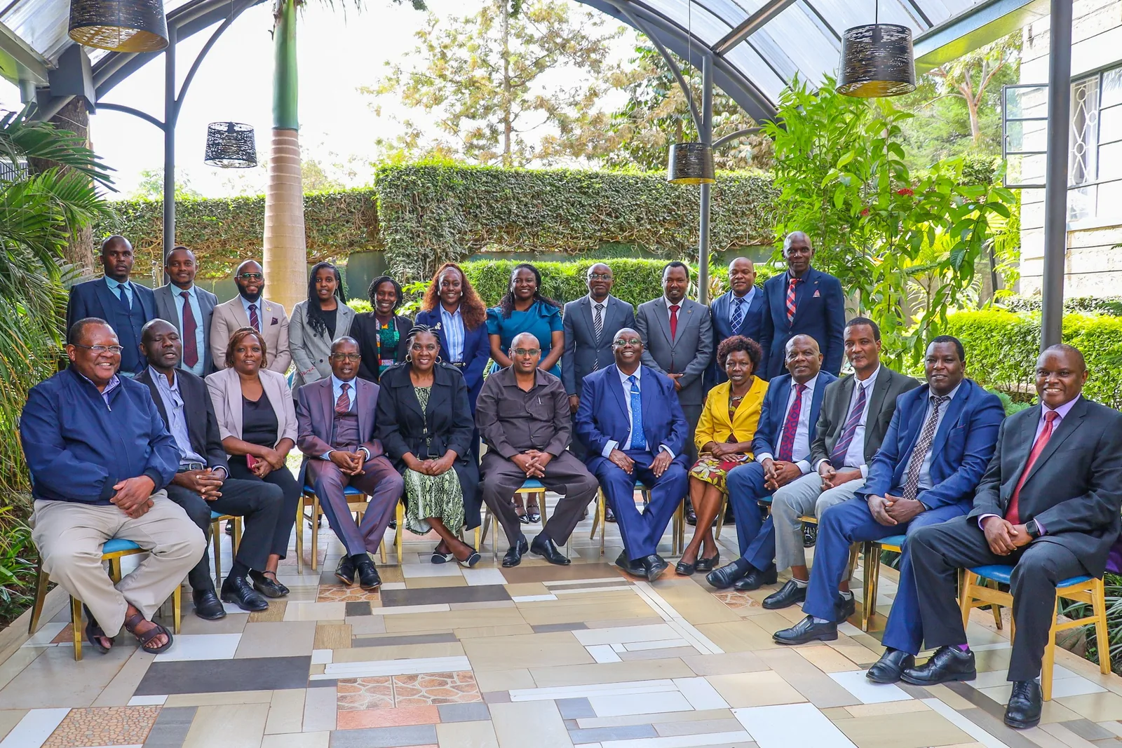 Group photograph of participants gathered for a professional engagement.
