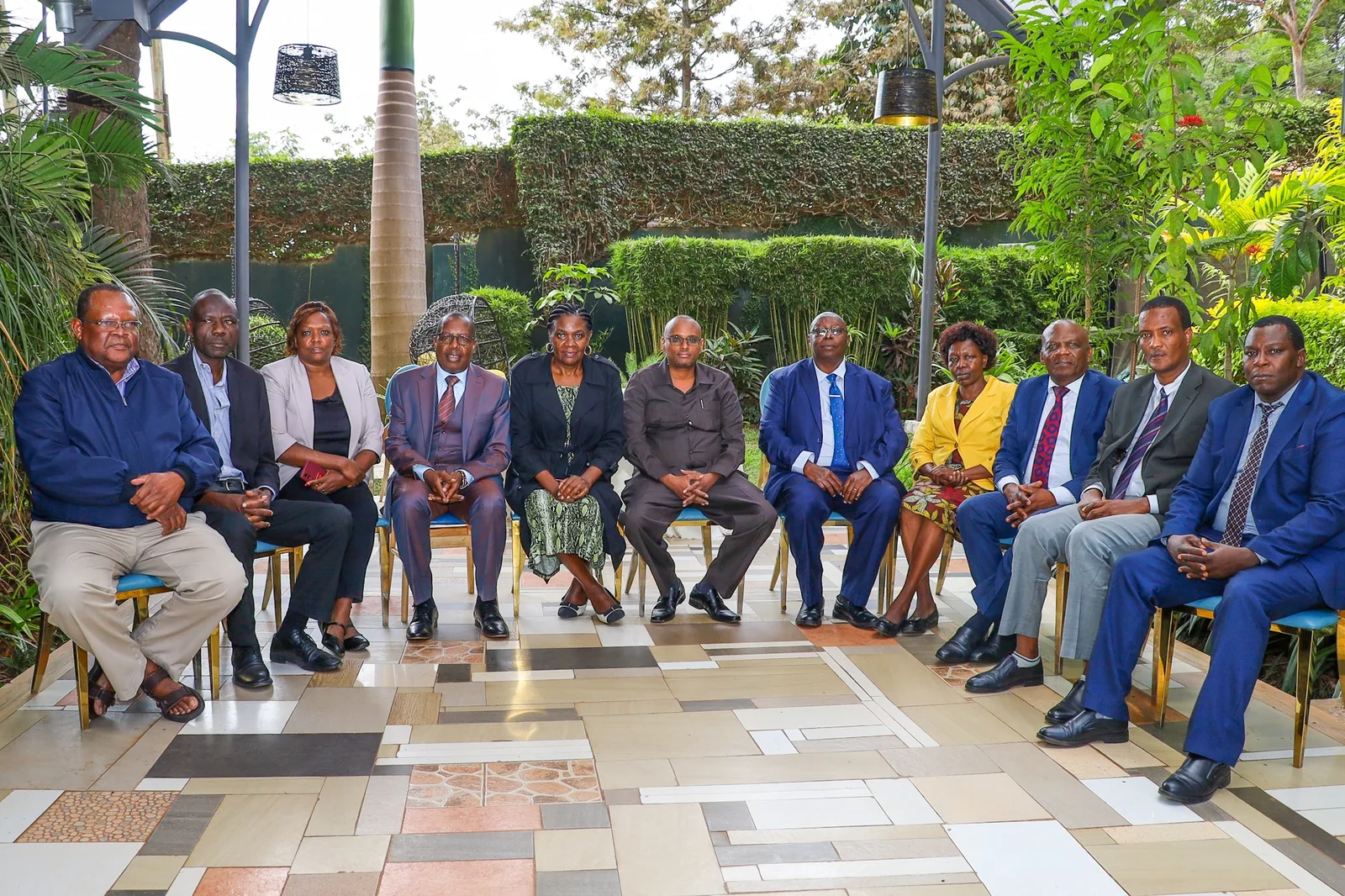 Participants seated together for a group photograph.